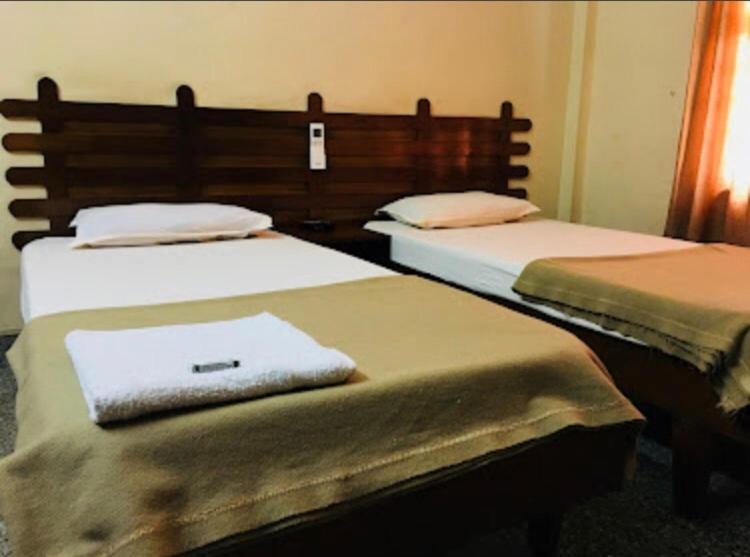 Nellimoottil Guest House Kottayam Phòng bức ảnh