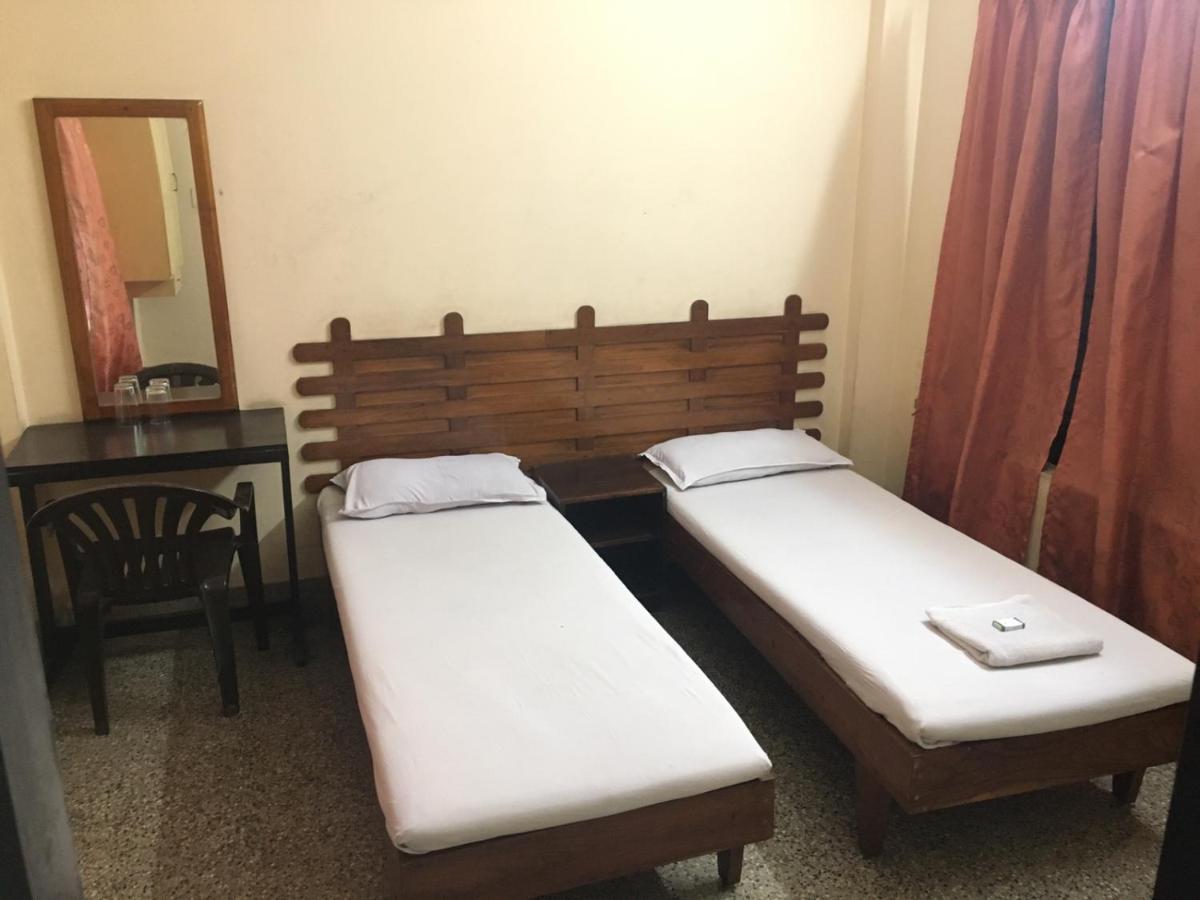 Nellimoottil Guest House Kottayam Phòng bức ảnh