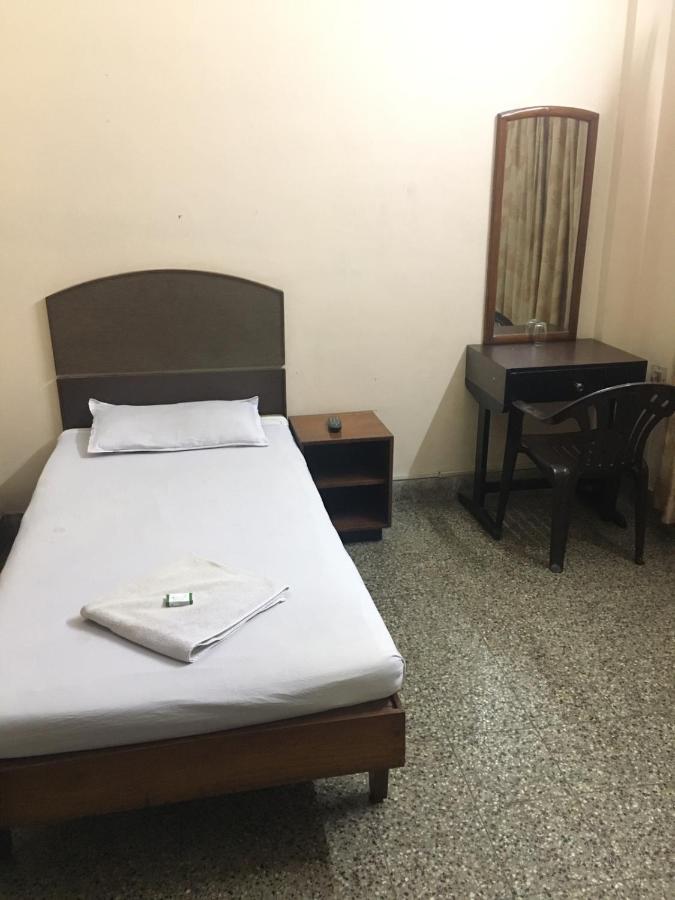 Nellimoottil Guest House Kottayam Phòng bức ảnh